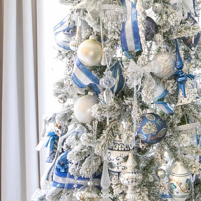 Elegant White Christmas Tree With Blue Decorations